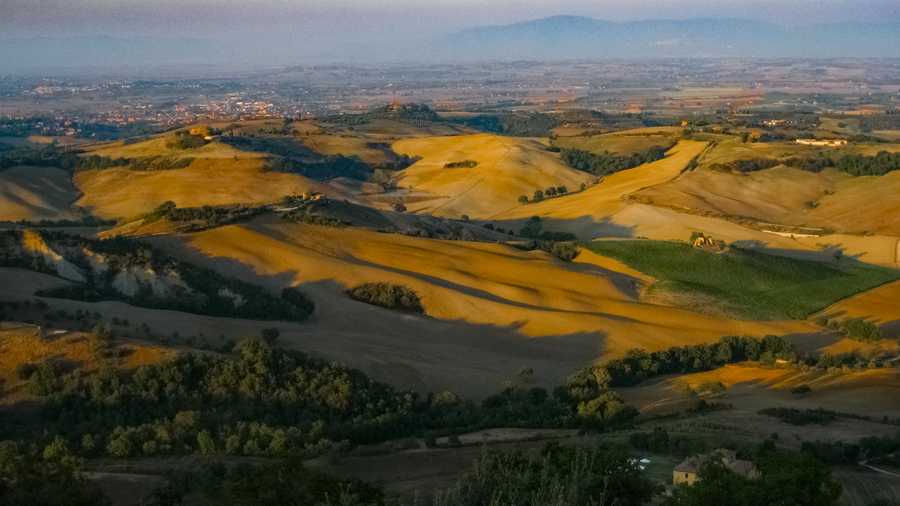 The green and gold rolling hills of Tuscany.