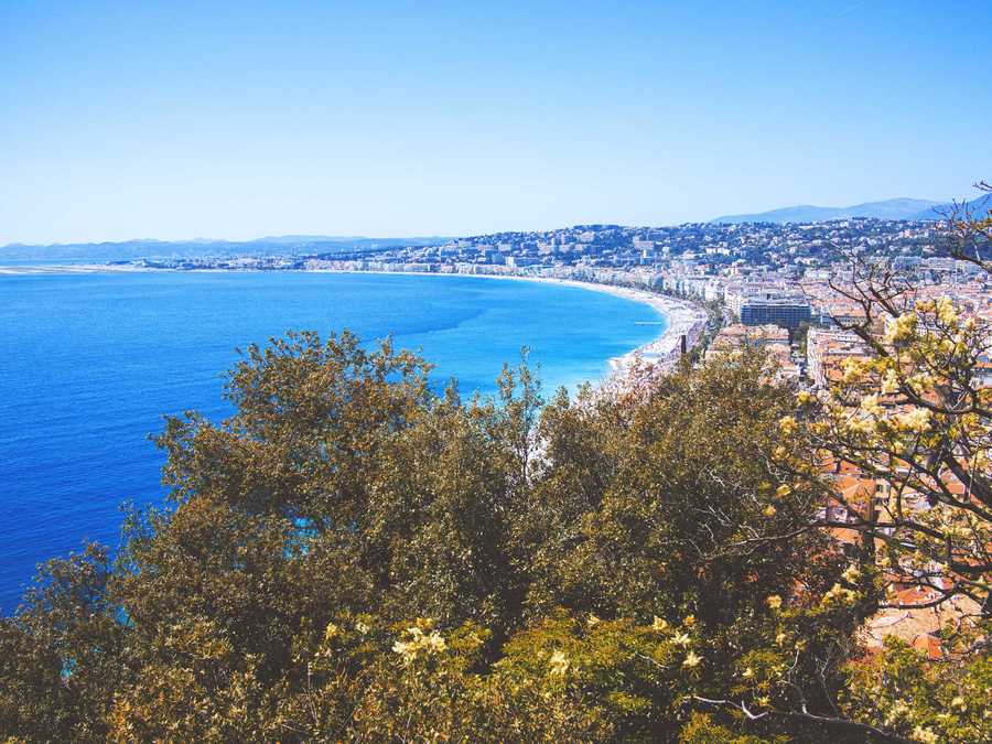 Looking out along the coastline of Nice and over the bright blue Côte d'Azur.